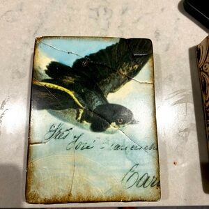 Retired 'bird in flight' sid dickens tile.